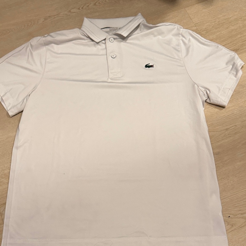 Men’s large Lacoste sport polo in white. Small mark on last picture